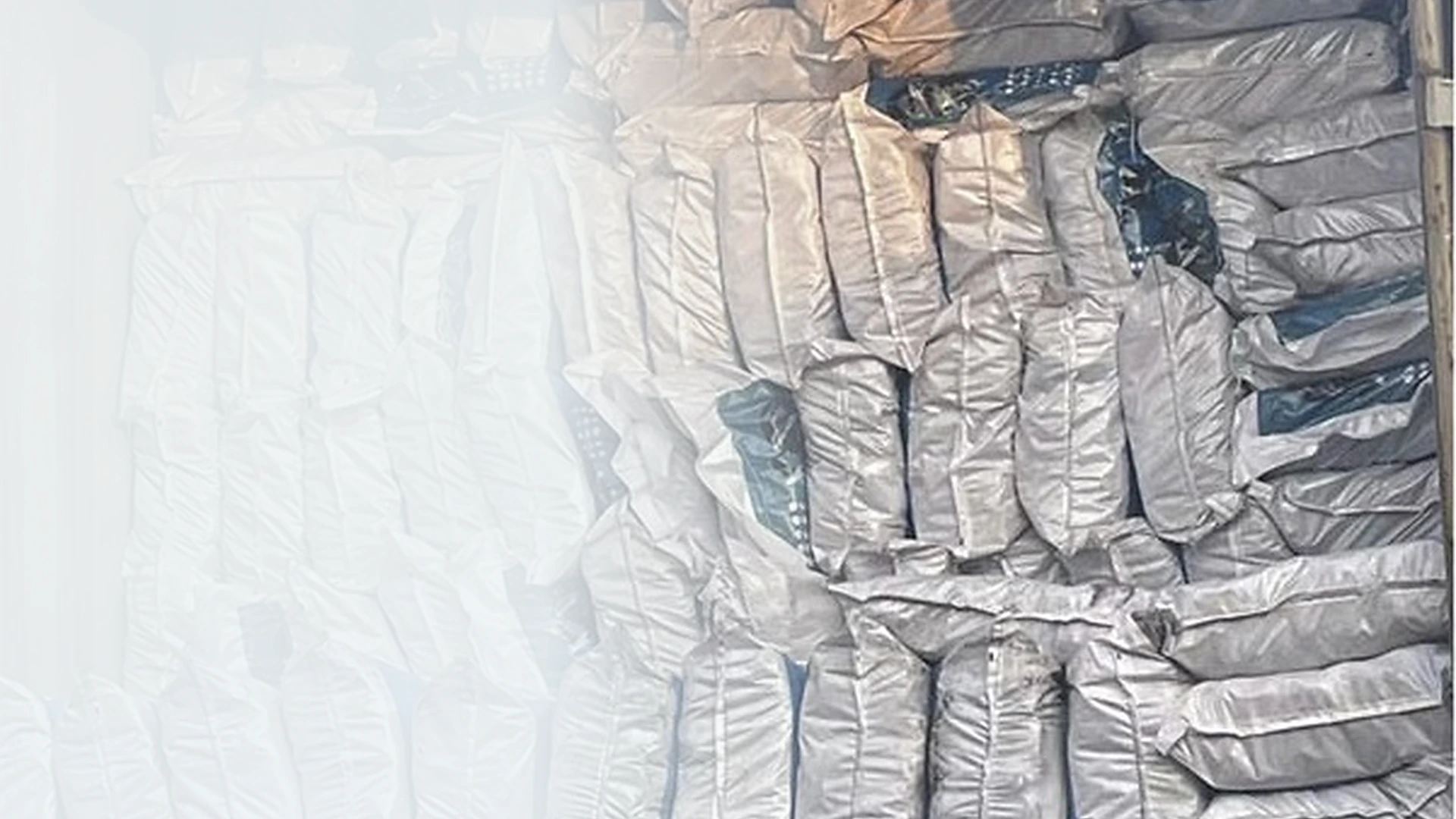 Motorcycle tyres wrapped and loaded in a shipping container