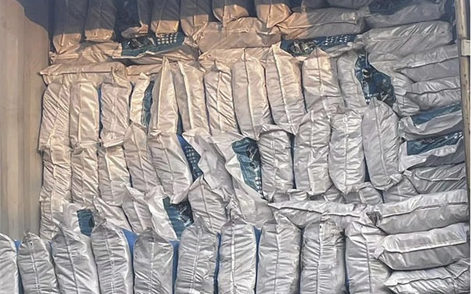 Motorcycle tyres wrapped individually in a shipping container